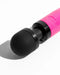 Close-up of a vibrant pink Doxy Die Cast 3 Compact Wand Vibrator Hot Pink with a black flexible head, casting a soft shadow on a white background.