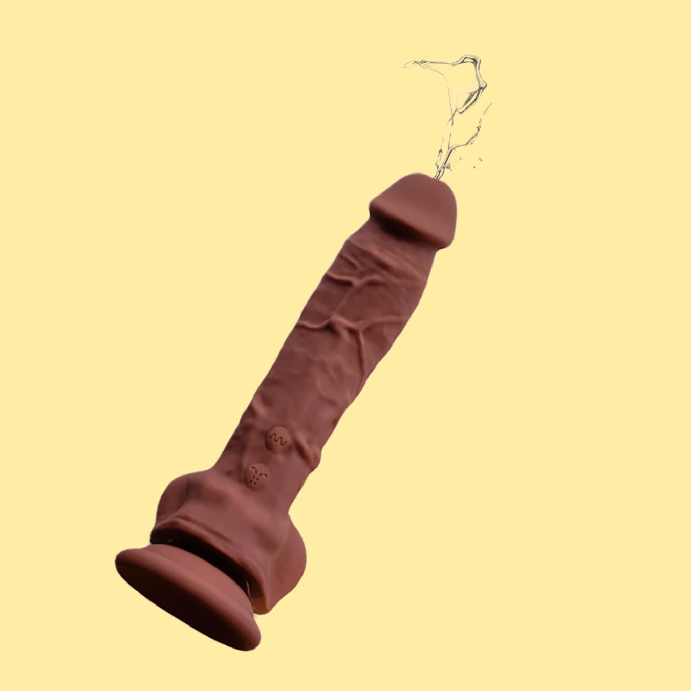 A realistic, brown dildo with a suction base is shown upright against a pale yellow background, with a liquid squirting from the tip.