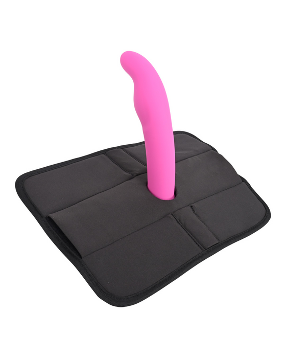 Pink silicone Pivot 3 in 1 Play Pad Toy Mount on a black carrying case by Sportsheets.