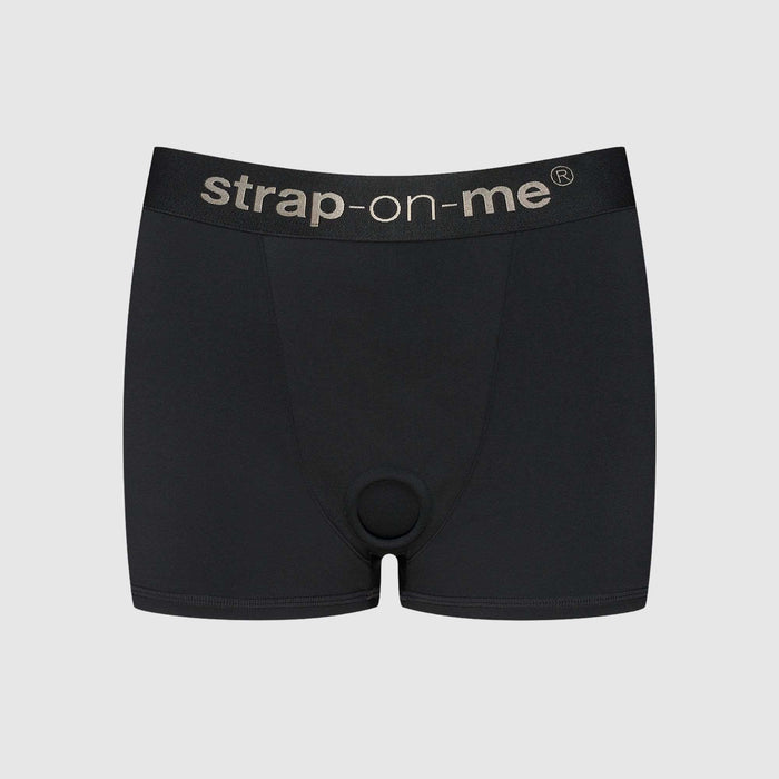 The Strap On Me Allure Boxer Style Harness is a black, high-waisted boxer with "strap-on-me" on the waistband and a front O-ring for easy strap-on attachment.
