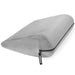 The Liberator Jaz – Discreet Positioning Support Cushion is a gray, wedge-shaped pillow with a smooth cover and visible zipper tagged "LIBERATOR," designed for bedroom support and comfort.