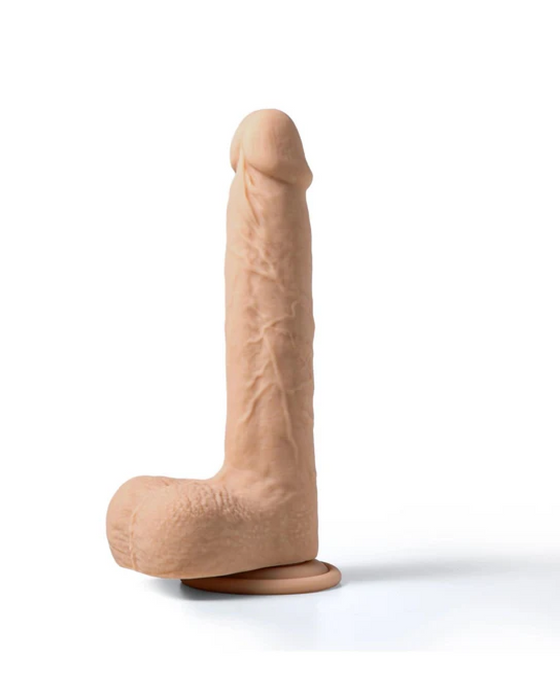 A Luis Thrusting Warming Large 8.5" Realistic App Controlled Dildo by Honey Play Box, with detailed textures, standing upright on a white background.