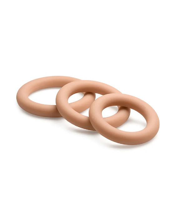 Three interconnected Jock Discreet Silicone Cock Ring Sets in graduated sizes on a white background.