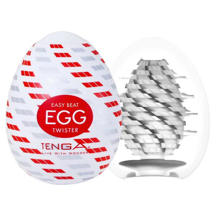 A white, egg-shaped Tenga Egg Disposable Penis Masturbator - Twister sits next to an opened version showing its spiral inner texture—an ideal compact travel sex toy and single-use masturbation sleeve.