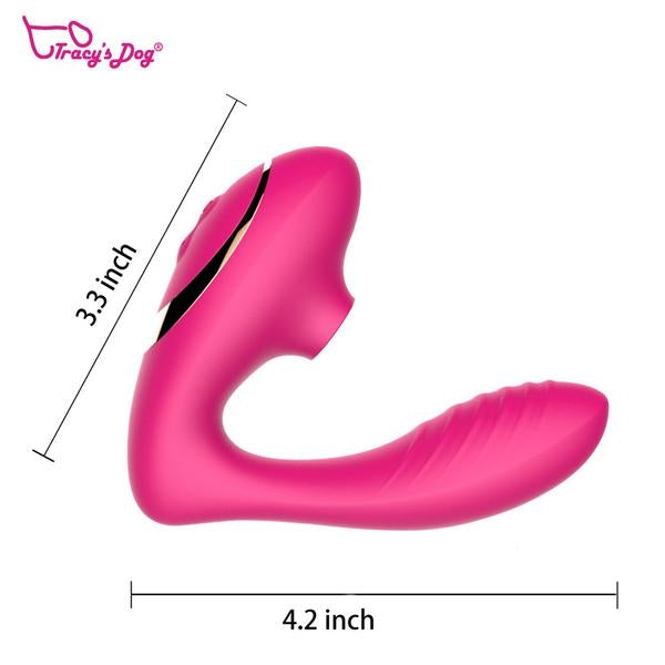 The Tracy's Dog OG Clitoral Sucking G-Spot Vibrator, a pink L-shaped toy with a textured surface (3.3" tall, 4.2" long), is pictured on a white background with the Tracy’s Dog logo in the top left corner.