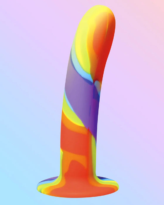  A colorful rainbow silicone dildo against a gradient background.