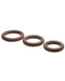 Three Jock Discreet Silicone Cock Ring Set - Chocolate candies of graduated sizes aligned diagonally on a light background.