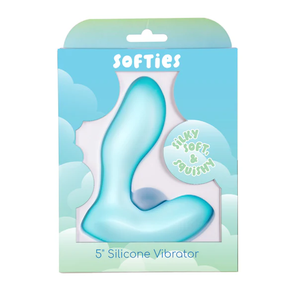 The Softies Dual Stimulation G-Spot Beginner Vibrator, a light blue L-shaped silicone toy, comes in a pastel blue and green box marked "Softies" and "5'' Silicone Vibrator," featuring "Silky Soft & Squishy" texture and waterproof design.