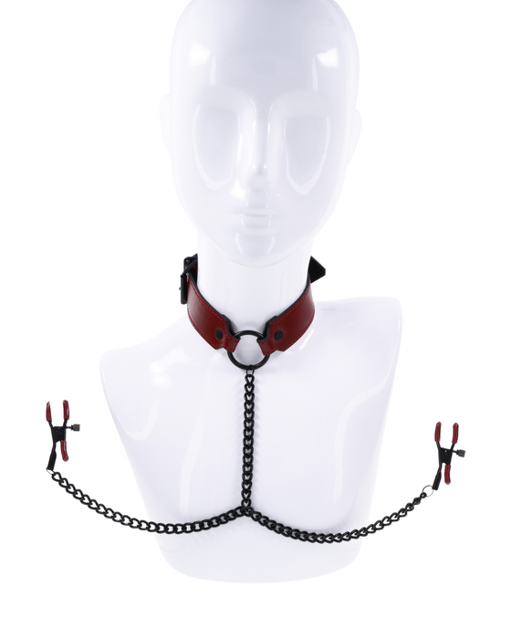 Necklace with a mannequin bust display and two small silhouettes connected by a chain, featuring Saffron Collar with Nipple Clamps from the Sportsheets Intimate Collection.