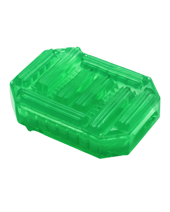 A translucent green Tenga plastic storage box with a detailed, step-textured pattern on the lid, set against a solid white background.