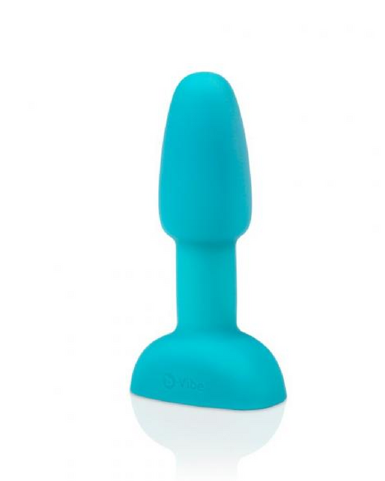 A turquoise, body-safe silicone B-Vibe Rimming Butt Plug Petite with Remote Control on a white background.