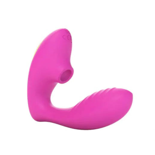 The Tracy's Dog OG Clitoral Sucking G-Spot Vibrator is a pink, L-shaped silicone toy with a textured surface and a circular opening for clitoral suction, designed for dual intimate pleasure.