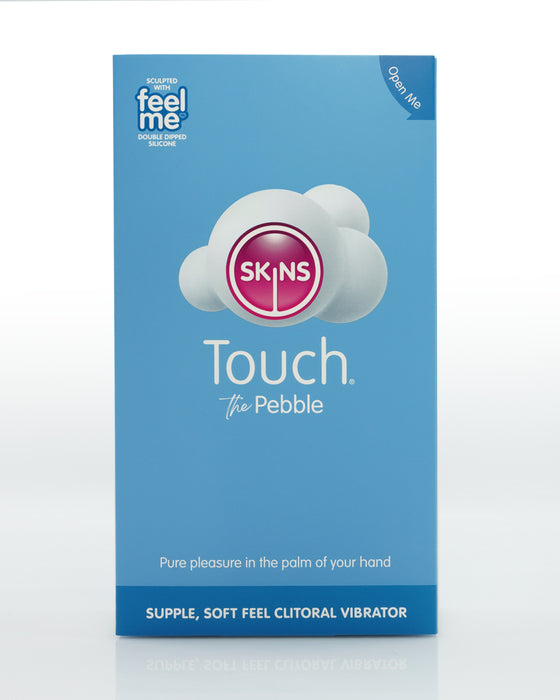 Box of skins touch "the sensual Pebble Ultra Soft Flexible Silicone First Time External Vibrator - Blue" clitoral vibrator by Creative Conceptions, featuring a logo within a cloud and text detailing the product as a supple, soft feel vibrator for pure pleasure.