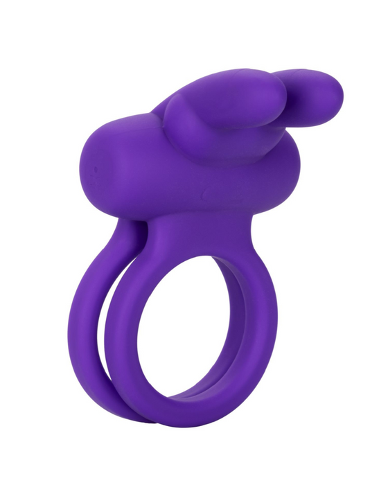 A CalExotics Dual Rockin Purple Rabbit Vibrating Couples Cock Ring with an attached ergonomic extension and vibrating bunny ears, isolated on a white background.