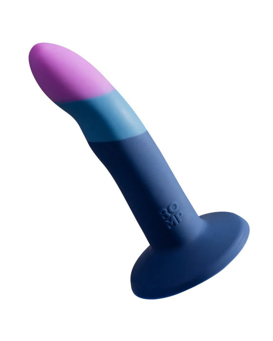 A colorful silicone Lovehoney Romp Piccolo First Time Pegging Kit - Strap on Harness + Dildo with a gradient from pink to blue, featuring a suction base, isolated on a white background.