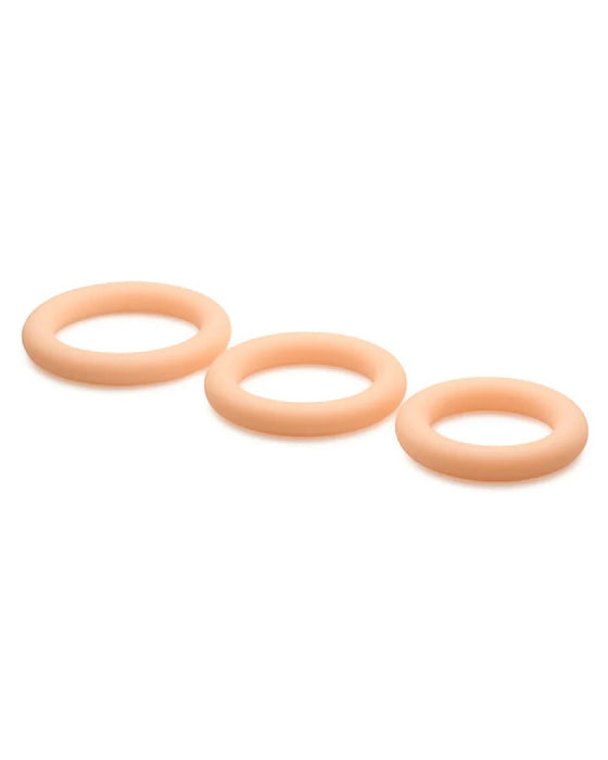Three Jock Discreet Silicone Cock Ring Sets in Vanilla from Curve Toys, each of varying graduated sizes, laid out on a plain white background.