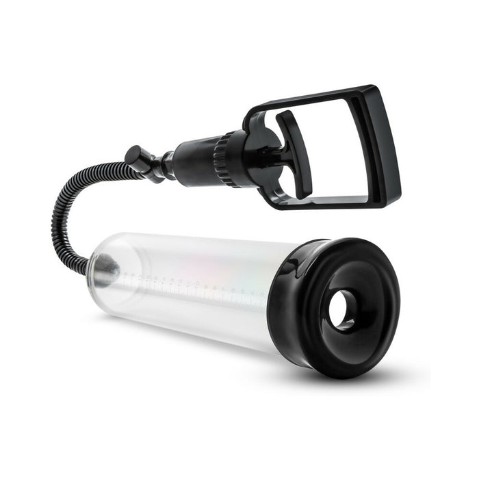 The Performance VX3 Male Enhancement Pump System with Cock Ring is a clear cylindrical vacuum pump featuring a black rubber base, flexible hose, and hand-held pump handle, designed for firmer erections. Photographed on a white background.