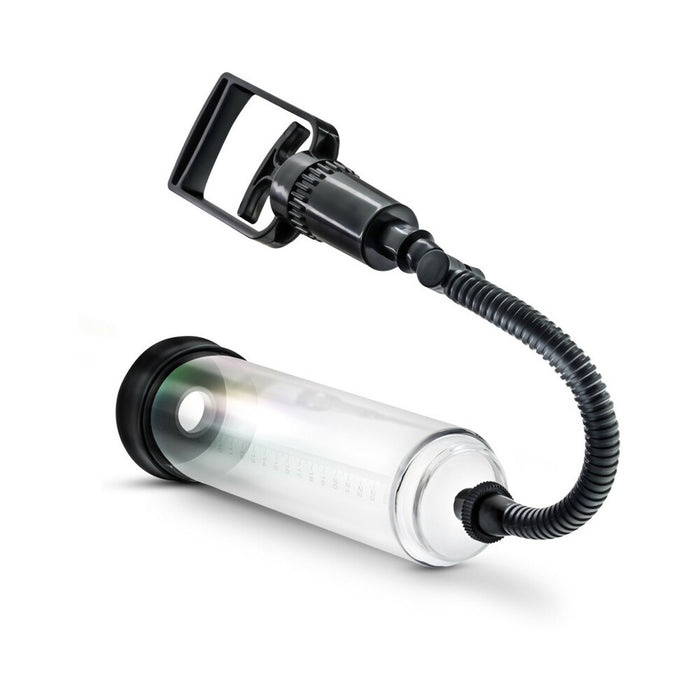 The Performance VX3 Male Enhancement Pump System with Cock Ring features a clear cylindrical chamber with measurement markings, a black flexible hose, and a hand pump handle to help achieve firmer erections.