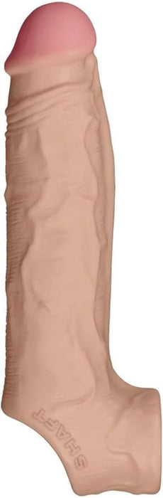 The Shaft Model F Ultra-Realistic 8 Inch Silicone Penis Sleeve with Ball Strap in Vanilla is shown vertically against a white background, featuring a lifelike flesh tone, detailed veins, and a pink tip.
