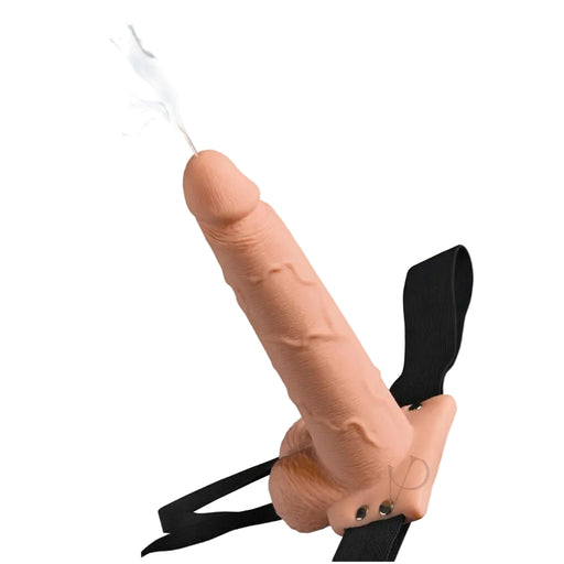 7.5-inch realistic vanilla PVC squirting dildo with sculpted details, testicles, and a black strap-on harness.