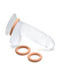 A rolled-up disposable condom with a Curve Toys Jock Discreet Silicone Cock Ring Set - Caramel containing three separate rubber rings of graduated sizes placed next to it on a white background.