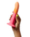 Hand holding a Lovehoney Romp Dizi Ultra Smooth 7 Inch Dildo With Suction Cup against a white background.