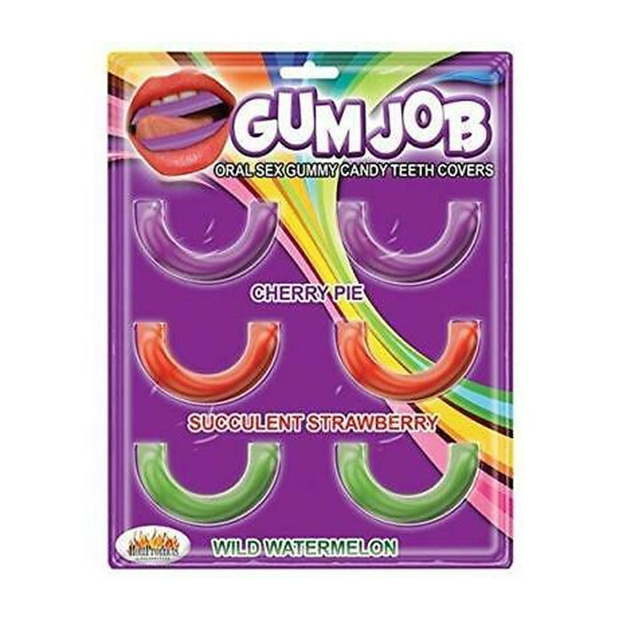 A package labeled "Gum Job Flavored Oral Pleasure Candy Teeth Covers" shows six edible covers in red, pink, and green flavors—Cherry Pie, Succulent Strawberry, and Wild Watermelon—on a vibrant rainbow background. Tasty oral toy fun!.