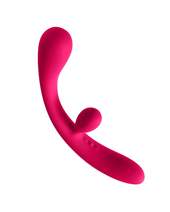 Bright pink, curved silicone Jimmyjane Reflexx Rabbit 3 First Time Slim Flexible Warming Vibrator with a protrusion and control buttons, isolated on a white background.
