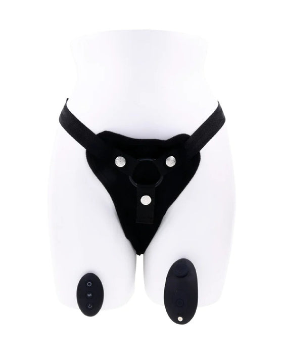 Adjustable black Sportsheets Hidden Pocket Strap On with remote control vibrator and detachable o-ring displayed on a white mannequin torso, isolated on a white background.