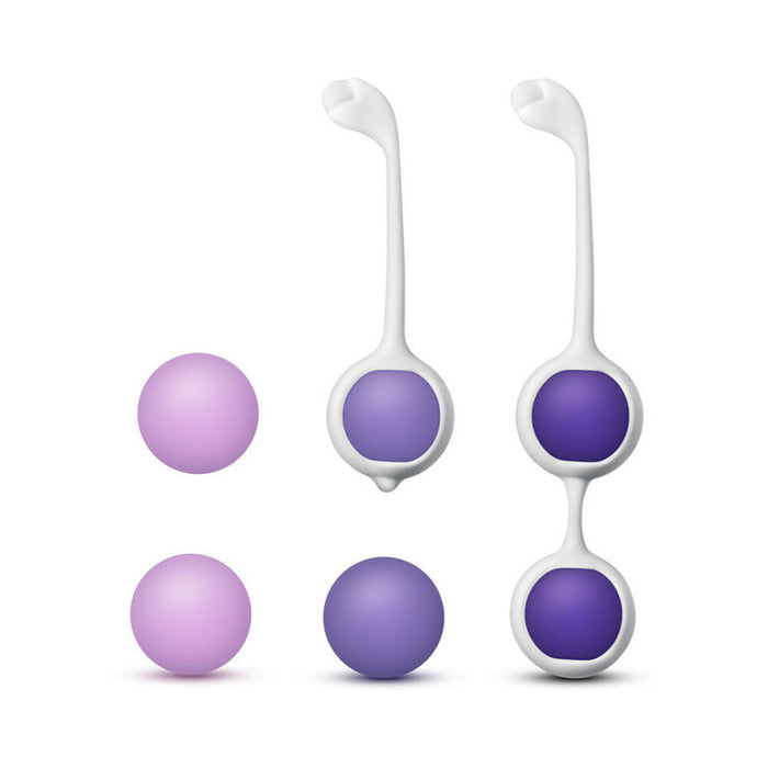 The Wellness Kegel Ball Training Kit for Pelvic Floor Health features two light purple and two dark purple round balls with looped handles, plus holders for one or two balls, designed to strengthen your pelvic floor.
