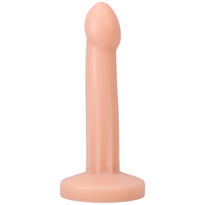 The Pop 7 Inch Silicone Squirting Dildo - Vanilla, a flesh-toned toy with a rounded tip and flared, harness-compatible base, stands upright against a white background.