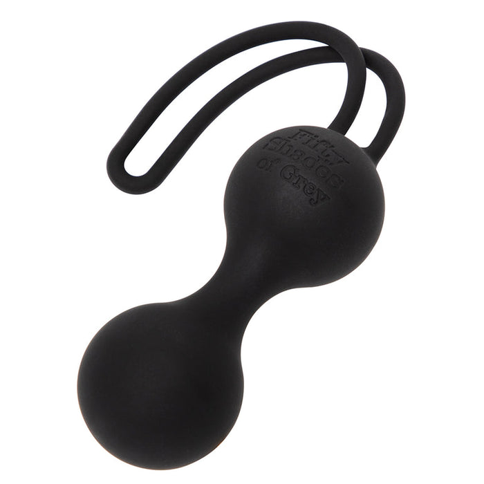 The Fifty Shades of Grey Desire Blooms Kit features black silicone kegel balls connected by a flexible stem with a retrieval loop and the iconic logo embossed on one ball—an elegant addition to any luxury couples kit.