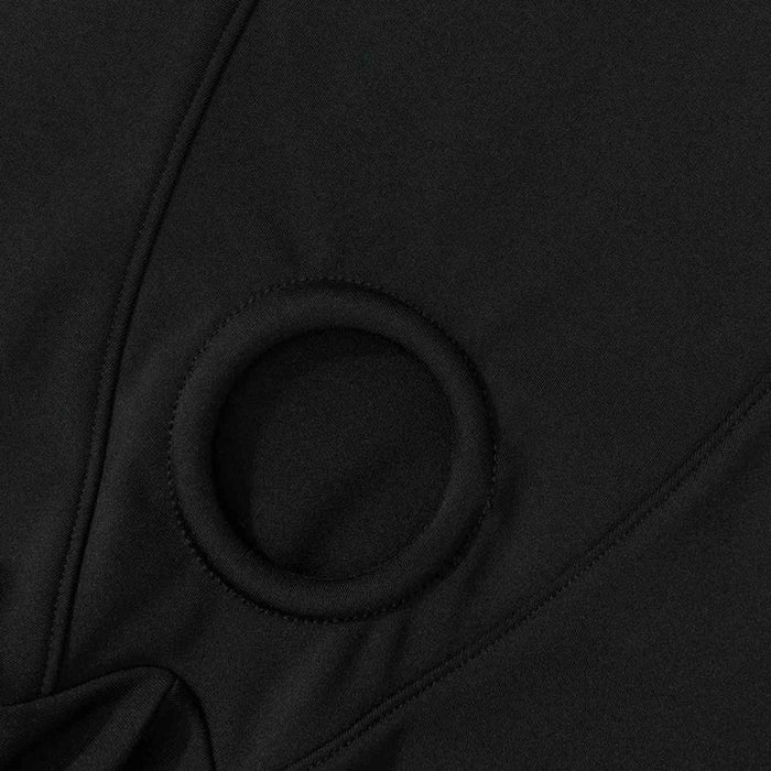 Close-up of the Strap On Me Allure Boxer Style Harness in black, showing the fabric's textured pattern with visible seams and a central circular stitched opening.