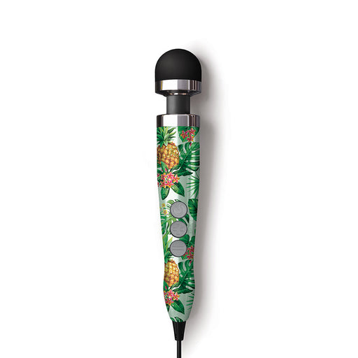 The Doxy Die Cast 3 Compact Wand Vibrator Pineapple Pattern features a black rounded head and a handle with tropical pineapples and green leaves, delivering deep rumbles and shown against a white background.