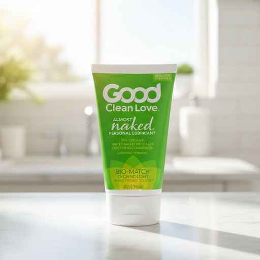 A green tube labeled "Good Clean Love Almost Naked Personal Lubricant with Aloe" features "95% organic aloe vera, water-based lubricant, doctor recommended," and "BIO-MATCH Technology" on the front; tube size: 4 fl oz (118 ml).