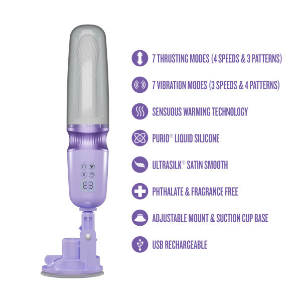 The Violet Vixen Warming Thrusting Vibrator with Suction Mount is shown in purple and white liquid silicone. Features include thrusting and vibration modes, warming technology, a suction cup base, and USB rechargeability.