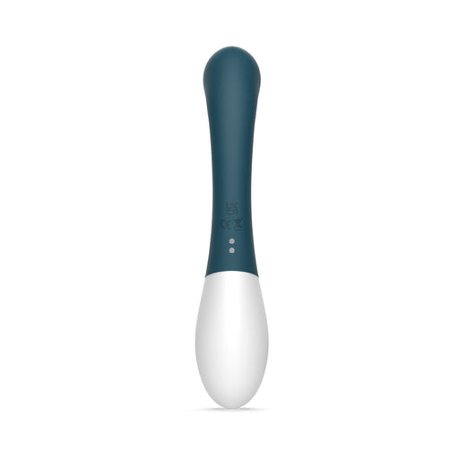 The Zini Soon Silicone G-Spot Vibrator is a blue and white, sleek, elongated toy with a rounded tip and ultra-soft silicone surface, shown standing upright against a plain white background.