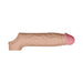 The Shaft Model F Ultra-Realistic 8 Inch Silicone Penis Sleeve with Ball Strap in Vanilla features vein-like textures, a pink tip, and "SHAFT" embossed on the base. Made from FLEXISKIN liquid silicone for lifelike sexual enhancement.