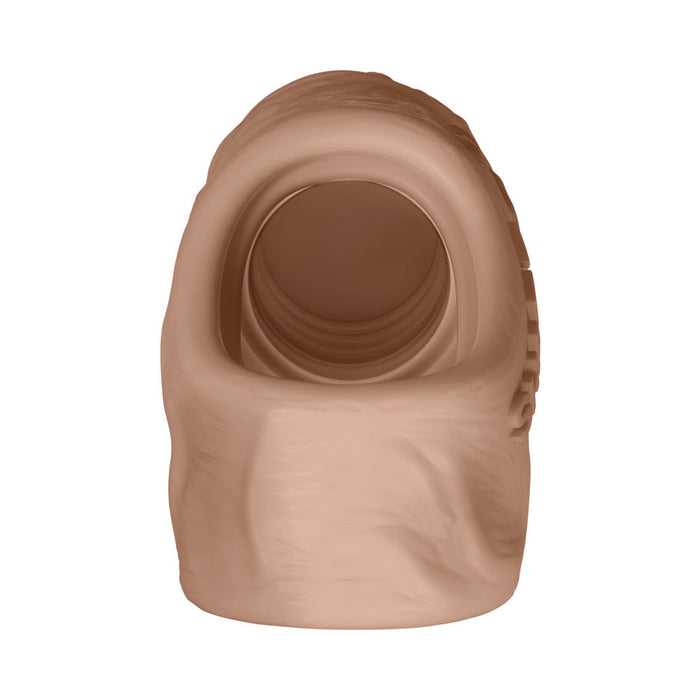 A front view of the Shaft Model F Ultra-Realistic 8 Inch Silicone Penis Sleeve with Ball Strap in Vanilla, made from FLEXISKIN liquid silicone and featuring a textured inner tunnel for use as a male stroker sleeve.