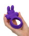 A hand holding a CalExotics Dual Rockin Purple Rabbit Vibrating Couples Cock Ring with vibrating bunny ears and a ring handle.