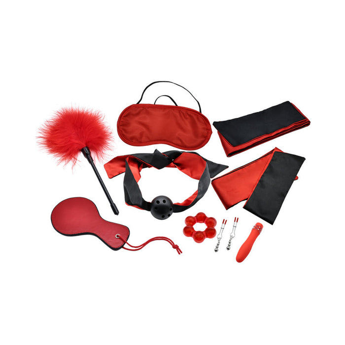 Discover the Sensual Scarlet Nights Beginner Bondage Collection for Curious Couples—featuring red and black essentials like a blindfold, feather tickler, paddle, ball gag, cuffs, collar, nipple clamps, and a mini vibrator.