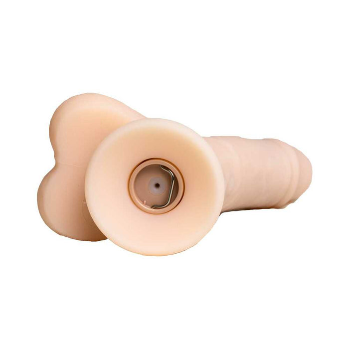 The Money Shot 8 Inch Vibrating Squirting Silicone Dildo (Ejaculating Strap on) in Vanilla features a realistic flesh-colored, cylindrical design with lifelike texture and a base that reveals its inner squirting mechanism.