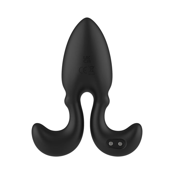 The Omega Vibrating Butt Plug with Remote Control is a black liquid silicone plug featuring a pointed tip, two curved base handles with control buttons, and body markings—designed for comfortable anal play.