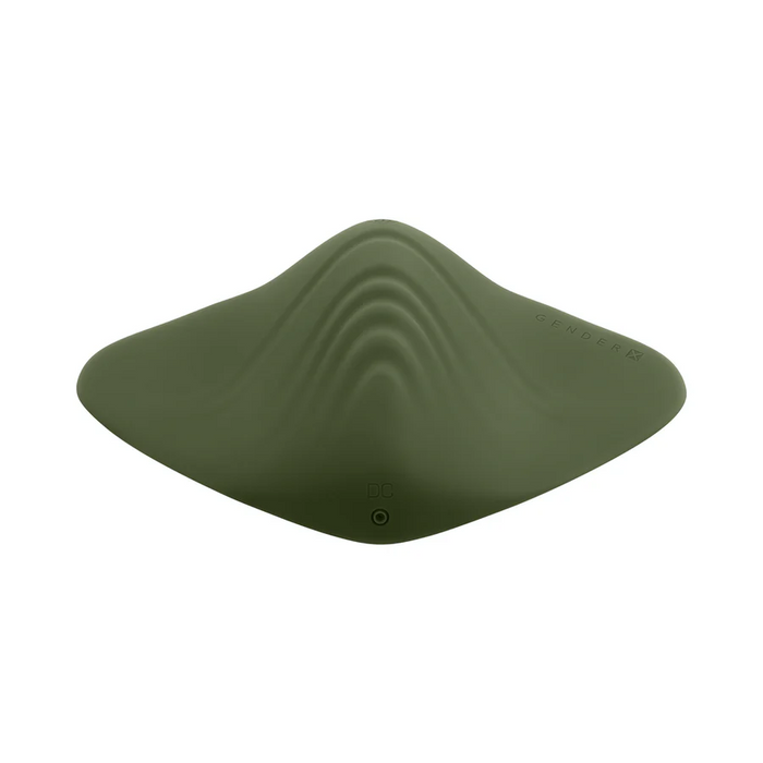 The Gender X Pleasure Pad Rechargeable Grinding Pad & Stroker is a green, smooth silicone insert with a wave-like, contoured design and "GENDER X" embossed on the upper right side.