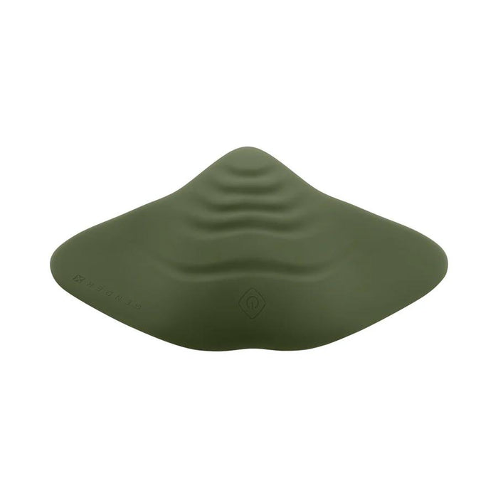 The Gender X Pleasure Pad Rechargeable Grinding Pad & Stroker is a green, flat, waterproof silicone pad with a wavy textured top, central raised ridge, and a power button icon on its surface.
