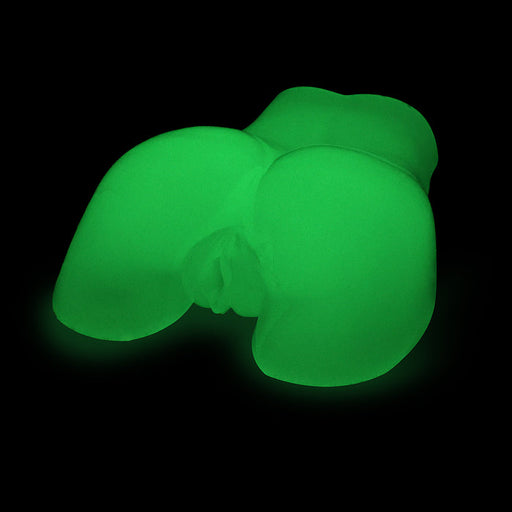 The Glow-in-the-Dark Peek-A-Booty Masturbator is displayed against a black background, highlighting its realistic feel and intricate details with a glowing green appearance.