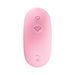 The Pout & Play Double Ended Vibrator with Licking Tongue comes with a pink, oval remote featuring two buttons—power and a unique icon—designed to pair seamlessly with your toy, shown on a white background.
