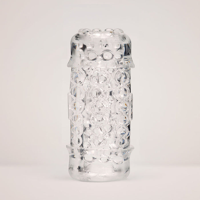 The Handy Mermaid Collection Pearl Sleeve stands upright against a plain, light background—a clear cylindrical glass piece featuring textured, bubble-like patterns reminiscent of real pearls.