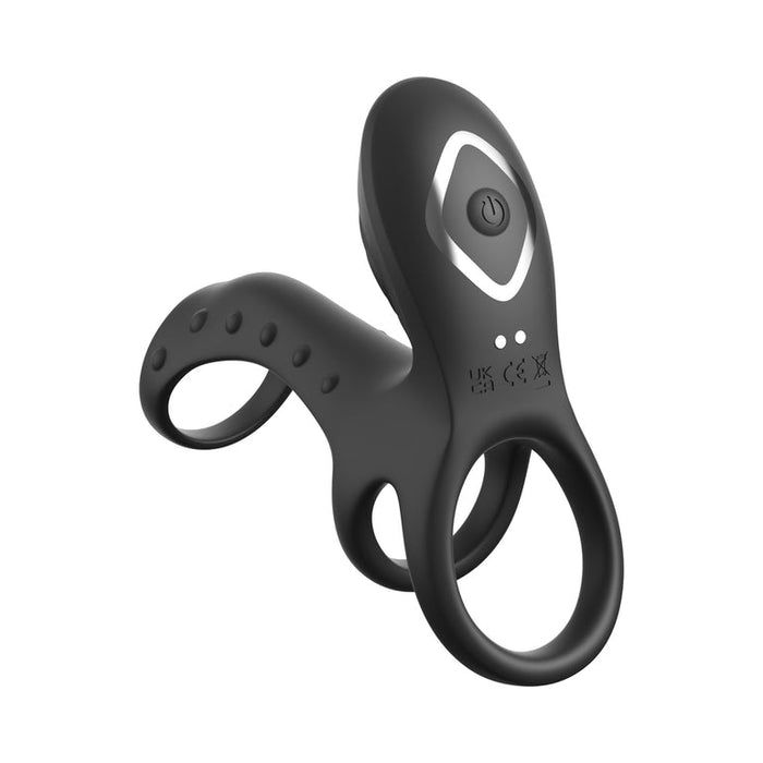 The Ultimate Couples Vibrating Cock Cage Pro is a black silicone vibrating cock ring with dual loops, textured bumps, a power button, and indicator symbols for enhanced clitoral stimulation, shown against a white background.