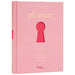 The pink hardcover "Pleasure: The Keys to Female Sensual Delights" features a sex-positive guide and a front cover keyhole cutout revealing a red pattern underneath.